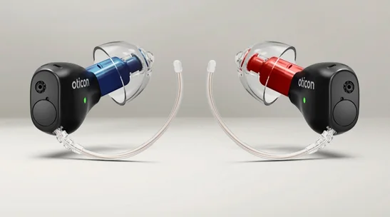 A pair of Oticon Zeal rechargeable in-the-ear hearing aids