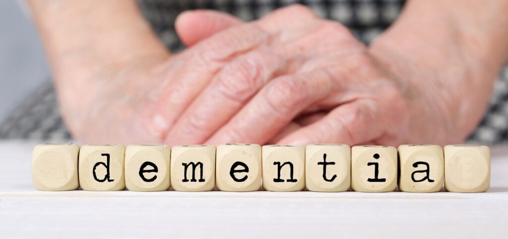 word dementia spelled on small wooden cubes