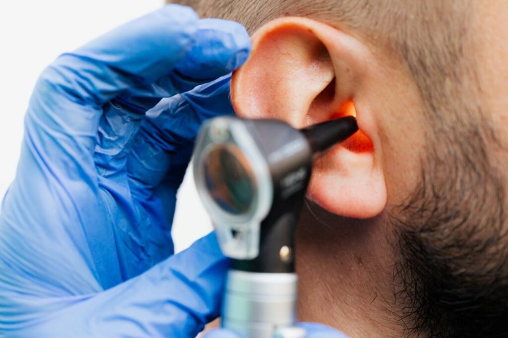 man having an ear checkup