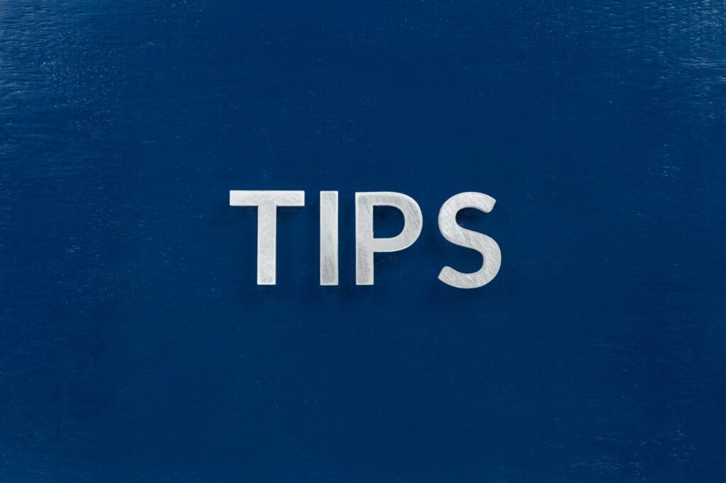 word tips in white font on blue background