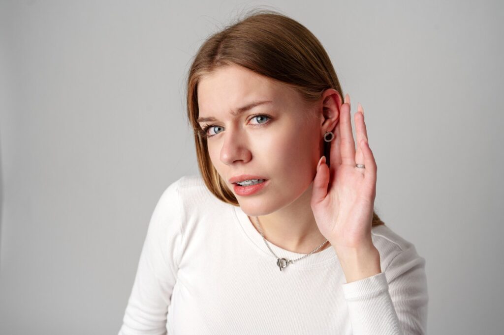 woman having problems with her hearing