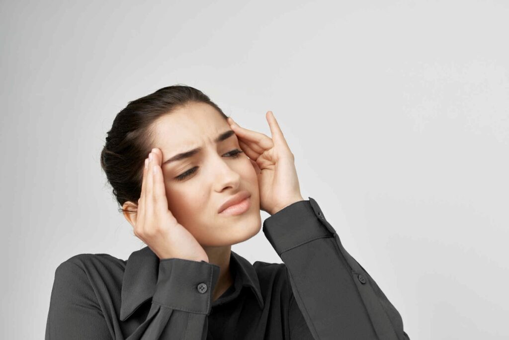 beautiful woman experiencing dizziness