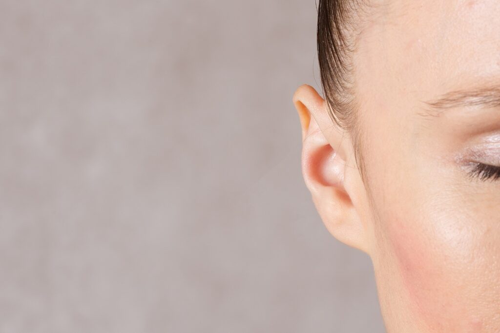 close up shot of a woman's ear
