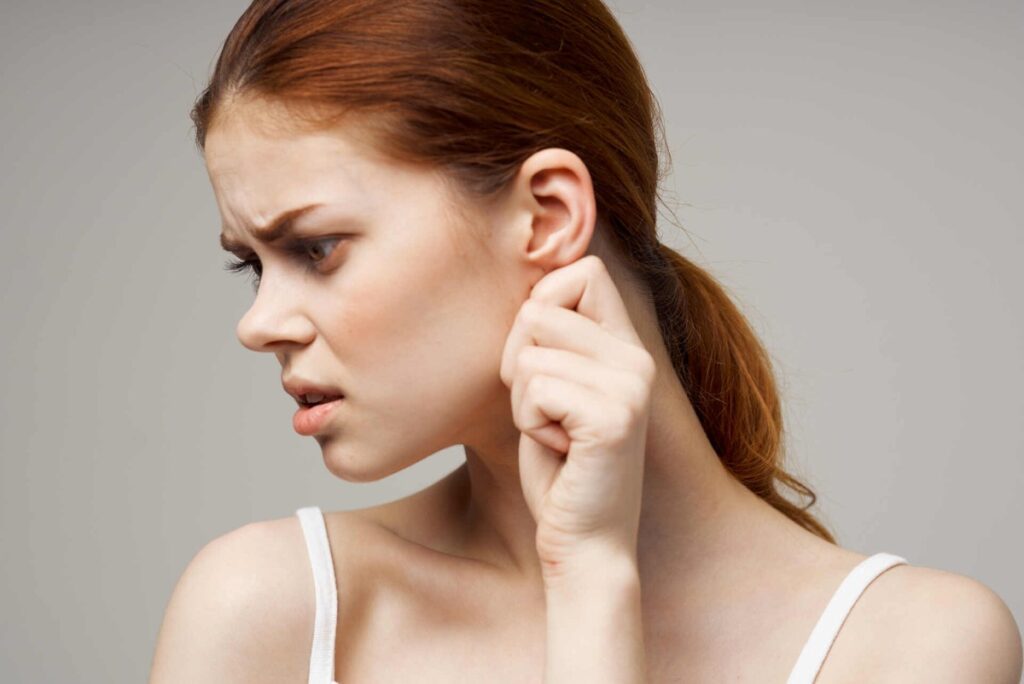 woman having problems with hearing