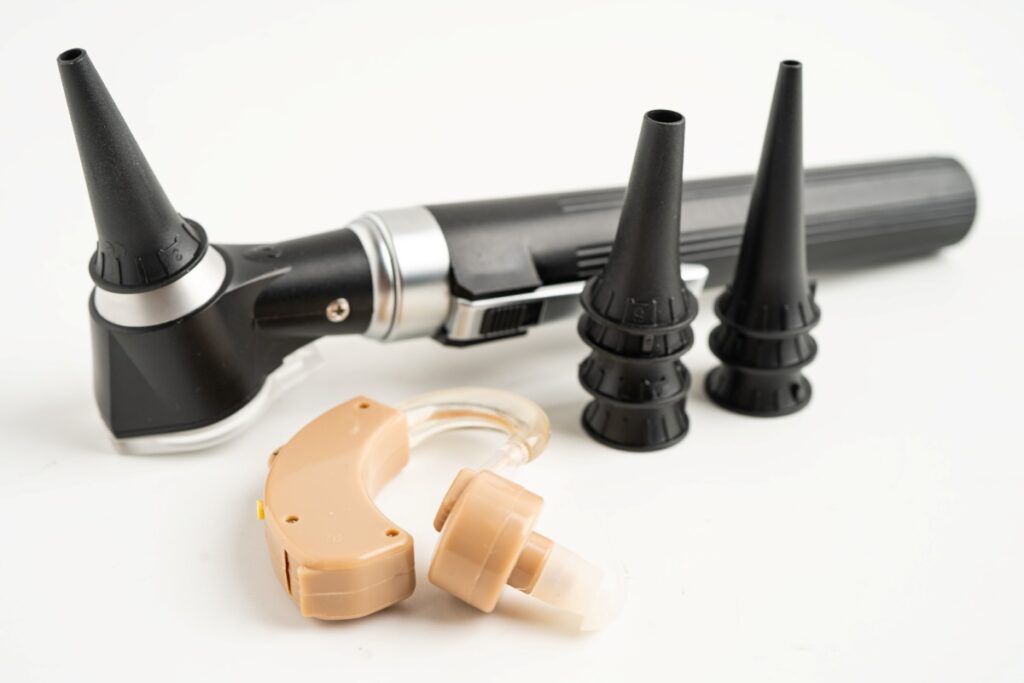 Otoscope isolated on white background for otolaryngologist or ENT physician doctor examining senior ear